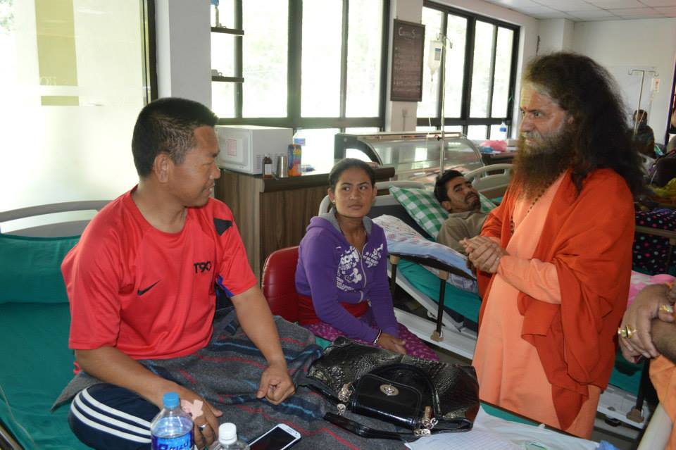 Pujya Swamiji Meets Patients in Nepal (3)
